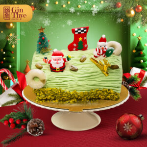 Gin Thye Premium Christmas Pistachio Log Cake 500g on festive table