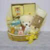 Gin Thye Baby Joy Hamper Yellow – Newborn Baby Shower Gift Yellow baby hamper by Gin Thye with Muji baby gift set, Johnson baby products, and premium cotton swaddle arranged in a yellow oval basket