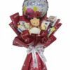 Gin Thye “Happy Birthday” Teddy & Snack Bouquet Gin Thye “Happy Birthday” gift bouquet with teddy bear, balloon, and chocolates wrapped in red paper