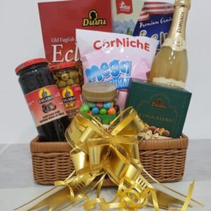 Golden Gin Thye Luxe Celebration Hamper featuring sparkling juice, chocolates, and premium snacks in rattan basket