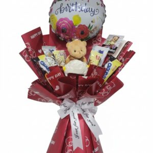 Gin Thye “Happy Birthday” gift bouquet with teddy bear, balloon, and chocolates wrapped in red paper