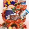 Christmas Holiday Bliss Hamper Gin Thye Holiday Bliss Hamper with chocolates, biscuits, and nuts arranged in a red oval basket