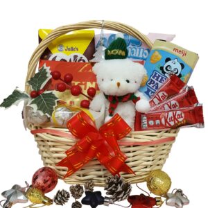 Gin Thye Winter Joy Hamper with marshmallows and chocolates in a yellow willow basket